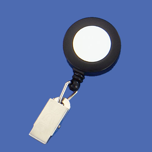 Retractable badge reel with metal clip