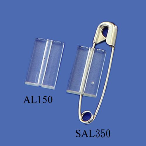 Safety pin with plastic base
